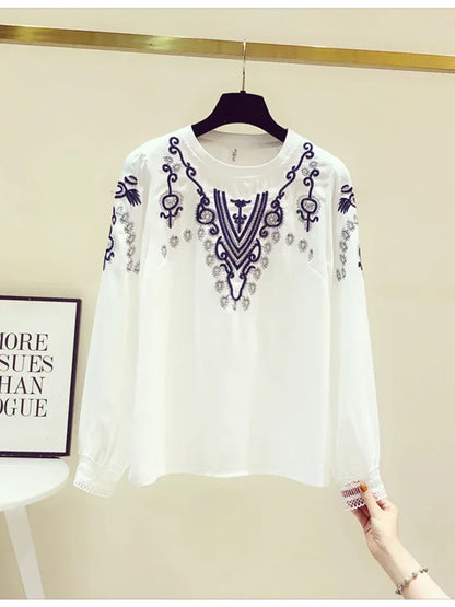 Bestickte Bluse mit Puffärmeln