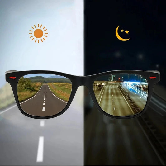 Black rectangular sunglasses shown against a split background: bright daylight on the left with a sun icon and a road reflection in the lens, and a dark night scene on the right with a moon and stars icon and a highway reflection in the other lens.