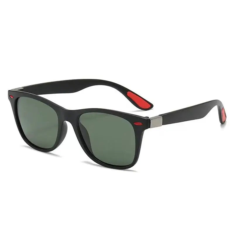 Black sunglasses with red accents on a white background