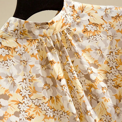 Vintage-Chiffonbluse mit Blumenmuster und Laternenärmeln
