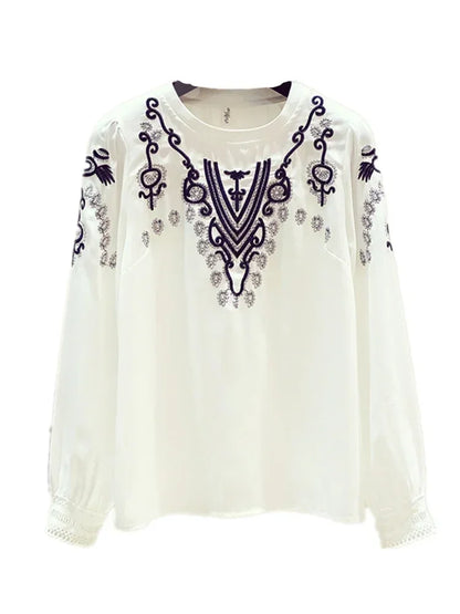Bestickte Bluse mit Puffärmeln