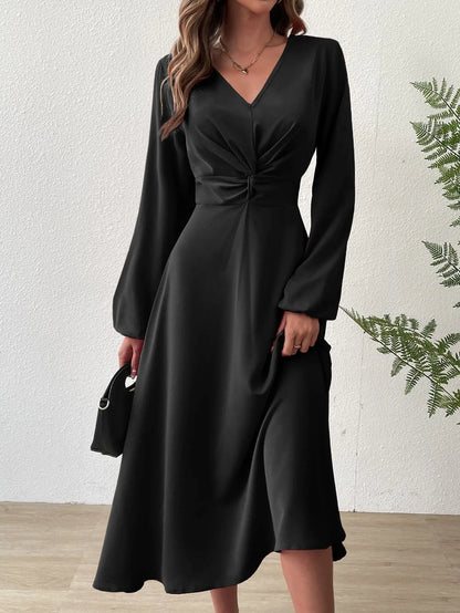 Vestido largo de mujer con cuello en V