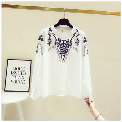 Bestickte Bluse mit Puffärmeln