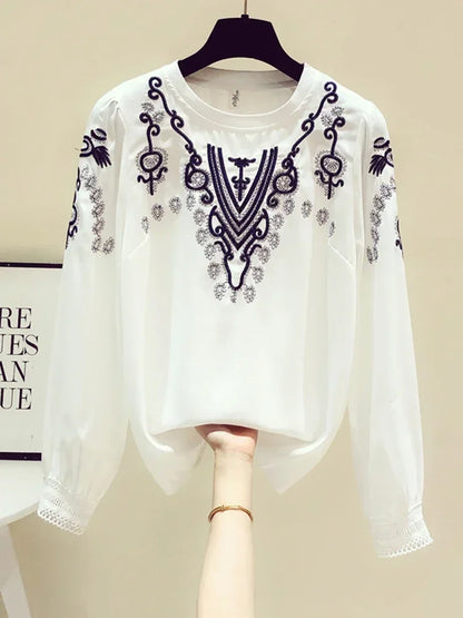 Bestickte Bluse mit Puffärmeln