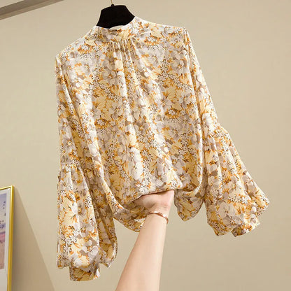 Vintage-Chiffonbluse mit Blumenmuster und Laternenärmeln
