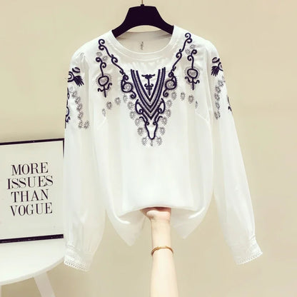 Bestickte Bluse mit Puffärmeln