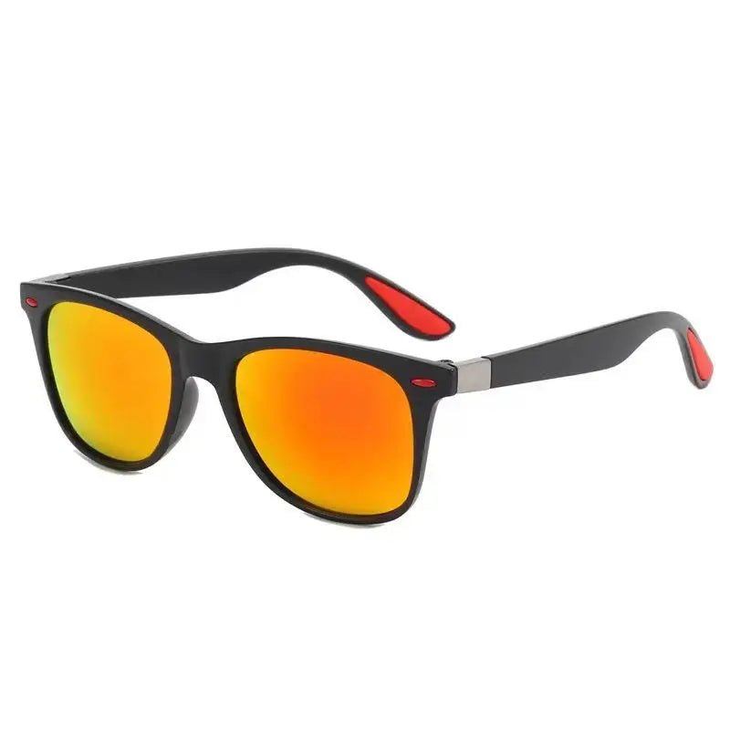 Sunglasses with black frame and red-orange lenses on a white background